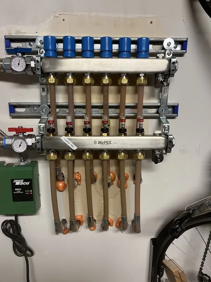 Plumber performing Water Heater Repair at a residential property in Belleville